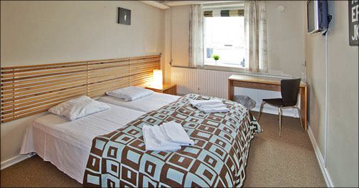 Nyd de skønne omgivelser og den dejlige mad på populære Nørherredhus Hotel på Als